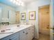 Well-lit bathroom featuring a marble countertop vanity, and shower/tub combo at 8316 Dye Makers, North Charleston, SC 29418