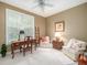 Bedroom with desk, sitting area, ceiling fan and large window at 8316 Dye Makers, North Charleston, SC 29418