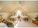 Bright bedroom showcasing beds, ceiling fan, and neutral decor at 8316 Dye Makers, North Charleston, SC 29418