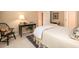 Cozy bedroom featuring a bedside table with lamp, area rug and neutral color palette at 8316 Dye Makers, North Charleston, SC 29418
