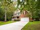 Lovely home with a spacious driveway and a well-kept yard, offering a welcoming curb appeal at 8316 Dye Makers, North Charleston, SC 29418