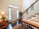 Foyer with hardwood floors, staircase, and front door at 8316 Dye Makers, North Charleston, SC 29418
