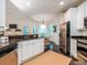 Bright kitchen with a breakfast nook, stainless steel appliances, and an open design at 8316 Dye Makers, North Charleston, SC 29418