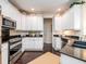 Modern kitchen with stainless steel appliances, granite countertops, and ample cabinet storage at 8316 Dye Makers, North Charleston, SC 29418