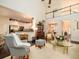 Bright living room showcasing an open floor plan, cathedral ceilings, and seamless access to kitchen at 8316 Dye Makers, North Charleston, SC 29418