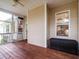 Comfortable screened porch featuring wood flooring, outdoor storage chest and a peaceful view at 8316 Dye Makers, North Charleston, SC 29418