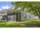 Enjoy a screened-in porch and landscaped backyard, perfect for relaxing or entertaining outdoors at 8721 Grassy Oak Trl, North Charleston, SC 29420