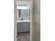 Bathroom features vanity, mirror, and modern gray cabinets with a white countertop at 8721 Grassy Oak Trl, North Charleston, SC 29420