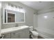 Bathroom featuring a modern vanity with framed mirror and tub with shower at 8721 Grassy Oak Trl, North Charleston, SC 29420
