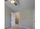 Bedroom with ceiling fan and natural light from open doorway, perfect for relaxing at 8721 Grassy Oak Trl, North Charleston, SC 29420