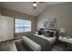 Stylish bedroom with a ceiling fan, neutral tones, and a comfortable bed at 8721 Grassy Oak Trl, North Charleston, SC 29420