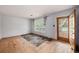 Bright living room features a large window and hardwood floors at 943 Mikell Dr, Charleston, SC 29412