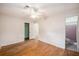 Main bedroom features wood floors, an ensuite bathroom and a ceiling fan at 943 Mikell Dr, Charleston, SC 29412