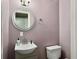 Cute bathroom featuring round mirror and sink with storage at 10 Stallion Ct, Charleston, SC 29407