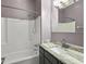 Bathroom featuring a bath and shower combo with dark cabinets at 10 Stallion Ct, Charleston, SC 29407