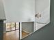 View from the top of the stairs to the spacious foyer below at 10 Stallion Ct, Charleston, SC 29407