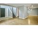 Spacious living room with light wood floors, staircase, and neutral-colored walls at 10 Stallion Ct, Charleston, SC 29407