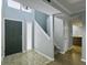 Spacious living room featuring staircase, entry door, and open view to the kitchen at 10 Stallion Ct, Charleston, SC 29407