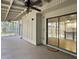Spacious screened porch with fan and access to both the backyard and the interior at 10 Stallion Ct, Charleston, SC 29407
