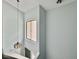 Bright stairwell featuring a window and a pendant light at 10 Stallion Ct, Charleston, SC 29407