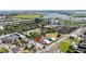 Aerial view of a neighborhood with a swimming pool and tennis courts near a river at 101 Hanover St, Charleston, SC 29403
