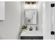 Stylish bathroom with a modern vanity, unique lighting, and elegant decor at 101 Hanover St, Charleston, SC 29403