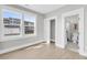 Neutral bedroom with two large windows and an en suite bathroom at 101 Hanover St, Charleston, SC 29403