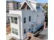 Stunning exterior showcasing sharp rooflines and modern window designs under a sunny sky at 101 Hanover St, Charleston, SC 29403