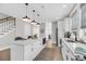 Bright kitchen featuring a large island with pendant lighting and modern appliances at 101 Hanover St, Charleston, SC 29403