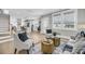 Open-concept living area with hardwood floors and views into the kitchen at 101 Hanover St, Charleston, SC 29403
