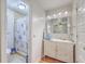 Updated bathroom with custom vanity, vessel sink, and tile shower with nautical decor at 106 Nottingham Ct, Summerville, SC 29485