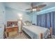 Inviting bedroom with ceiling fan, accent lighting, and stylish nautical decor at 106 Nottingham Ct, Summerville, SC 29485