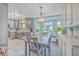 Eat-in dining area with stainless steel appliances, built-in bay window bench, and custom cabinets at 106 Nottingham Ct, Summerville, SC 29485
