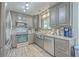 Updated kitchen with stainless steel appliances, granite countertops, and ample cabinet space at 106 Nottingham Ct, Summerville, SC 29485