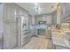 Renovated kitchen with stainless steel appliances, custom cabinetry, and farmhouse sink at 106 Nottingham Ct, Summerville, SC 29485