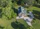 Home aerial shot with lush surroundings and long driveway at 1064 Blackbear Dr, Edisto Island, SC 29438