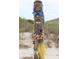 A whimsical piece of beach art, crafted from natural materials and vibrant accessories at 1064 Blackbear Dr, Edisto Island, SC 29438