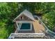 Aerial view showing a private plunge pool with cover on a spacious home deck and landscaping at 11 49Th Ave, Isle of Palms, SC 29451