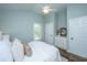 Bright bedroom offers serene retreat with hardwood floors and a light, airy ambiance at 11 49Th Ave, Isle of Palms, SC 29451