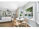 Breakfast nook with hardwood floors, natural light, and seamless access to the living area at 11 49Th Ave, Isle of Palms, SC 29451