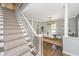 Formal dining room with hardwood floors, modern lighting, and elegant decor at 11 49Th Ave, Isle of Palms, SC 29451