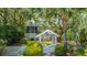 Beautiful home with manicured landscaping, privacy fence, and mature trees at 11 49Th Ave, Isle of Palms, SC 29451