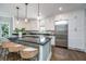 Spacious kitchen boasts a large island with seating, modern appliances, and plenty of cabinet space at 11 49Th Ave, Isle of Palms, SC 29451