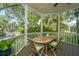 Charming outdoor gazebo features a wooden dining set and scenic views of the surrounding landscape at 11 49Th Ave, Isle of Palms, SC 29451