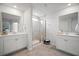 Bright bathroom with double sinks, tile floor and glass enclosed shower at 1115 Fitzgerald Ct, Summerville, SC 29485