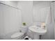 Bathroom featuring modern fixtures, flower accent, and shower with white curtain at 1115 Fitzgerald Ct, Summerville, SC 29485