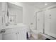 Bright bathroom featuring a glass shower, vanity, and ample natural light from the window at 1115 Fitzgerald Ct, Summerville, SC 29485