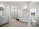 Bright bathroom with double sinks, tile floor, glass enclosed shower and toilet at 1115 Fitzgerald Ct, Summerville, SC 29485