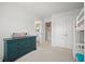 Bright bedroom featuring a bunk bed, neutral carpet, and direct access to the en-suite bathroom at 1115 Fitzgerald Ct, Summerville, SC 29485
