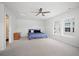 Neutral bedroom featuring a ceiling fan, carpet and a large window at 1115 Fitzgerald Ct, Summerville, SC 29485